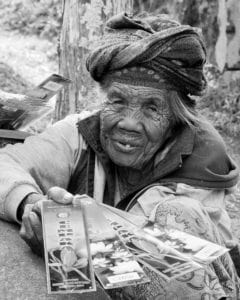 Elderly woman offering information